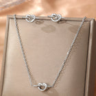 Komplet Biżuterii Sweetheart Knot – Naszyjnik i Kolczyki Hearts